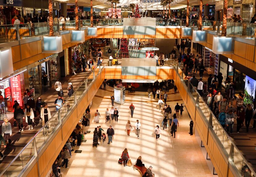 Crowds of people shop at Galleria Dallas during Black Friday shopping in Dallas on Friday,...