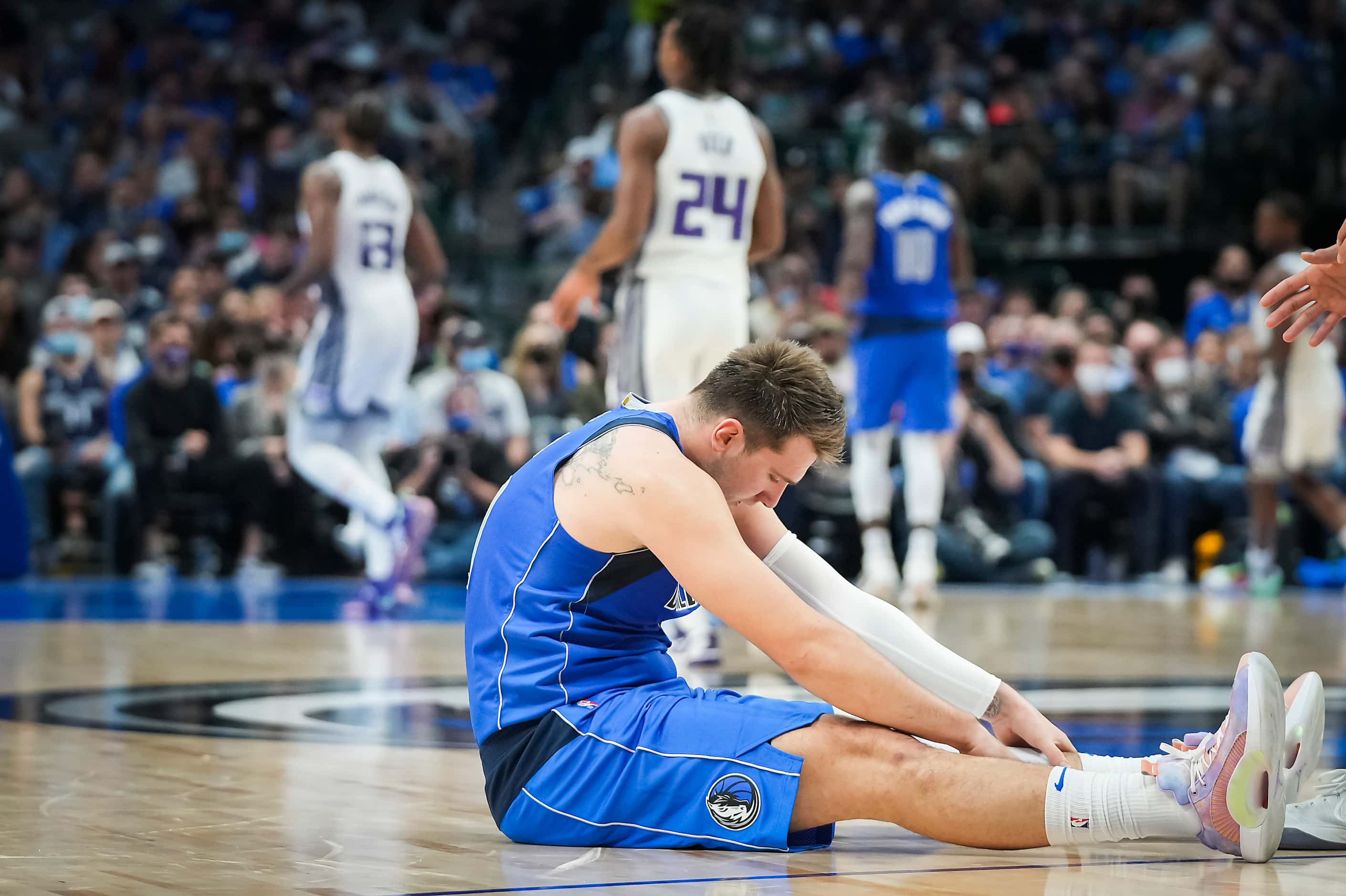 Dallas Mavericks guard Luka Doncic reacts after turning the ball over during the second half...