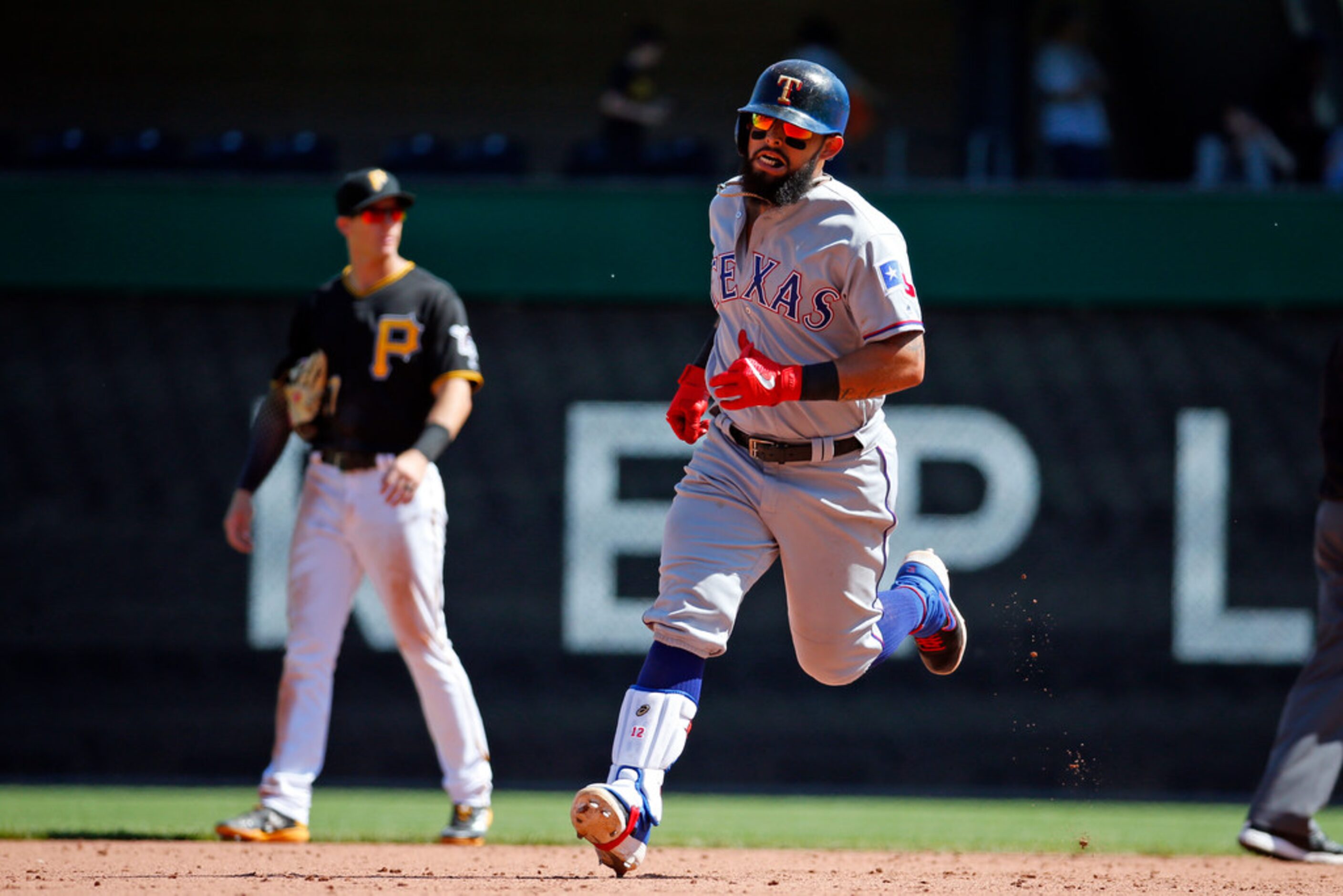 PITTSBURGH, PA - MAY 08:  Rougned Odor #12 of the Texas Rangers rounds second after hitting...