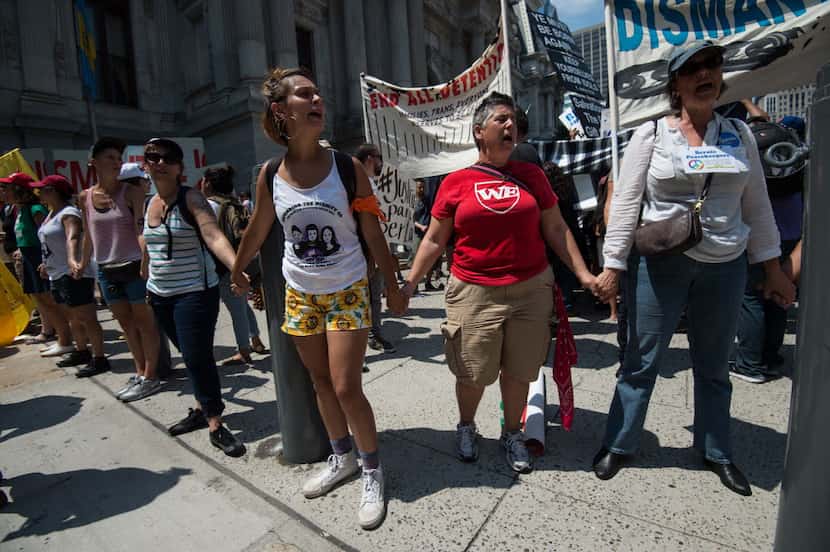 Supporters of undocumented immigrants chant during a rally at City Hall in Philadelphia on...
