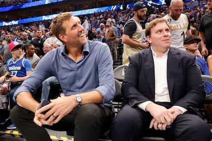 Dirk Nowitzki, former Mavericks player (left) and Patrick Dumont, new Mavericks governor,...
