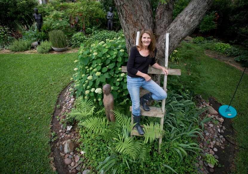 
Sculptor Deborah Ballard in her backyard garden at 1237 S. Selva Drive. Ballard is...