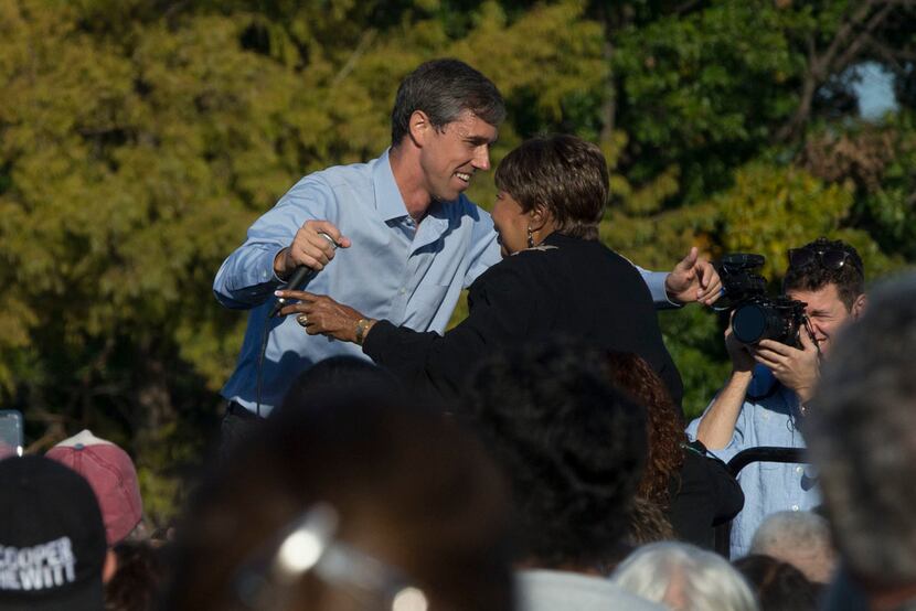 Rep. Beto O'Rourke hugs Congresswoman Eddie Bernice Johnson before speaking to a crowd at...