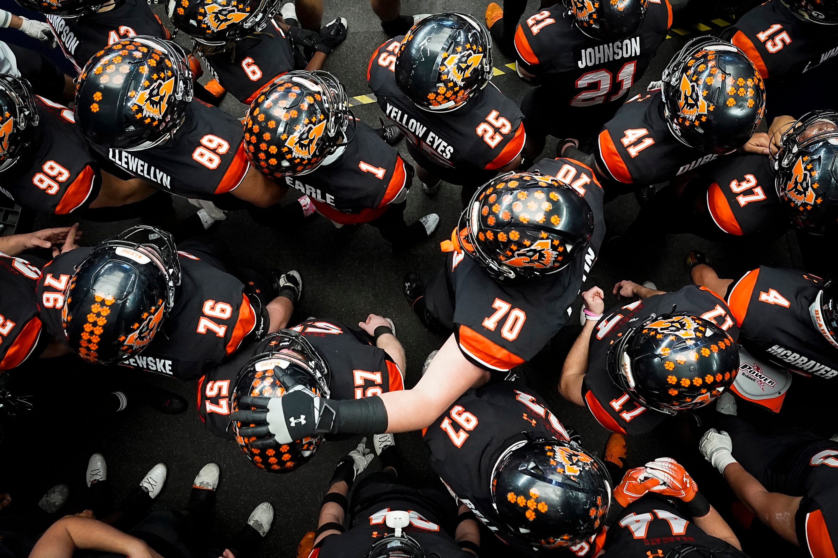 Aledo players, including offensive lineman Jurrien Loftin (70) and offensive lineman Brady...