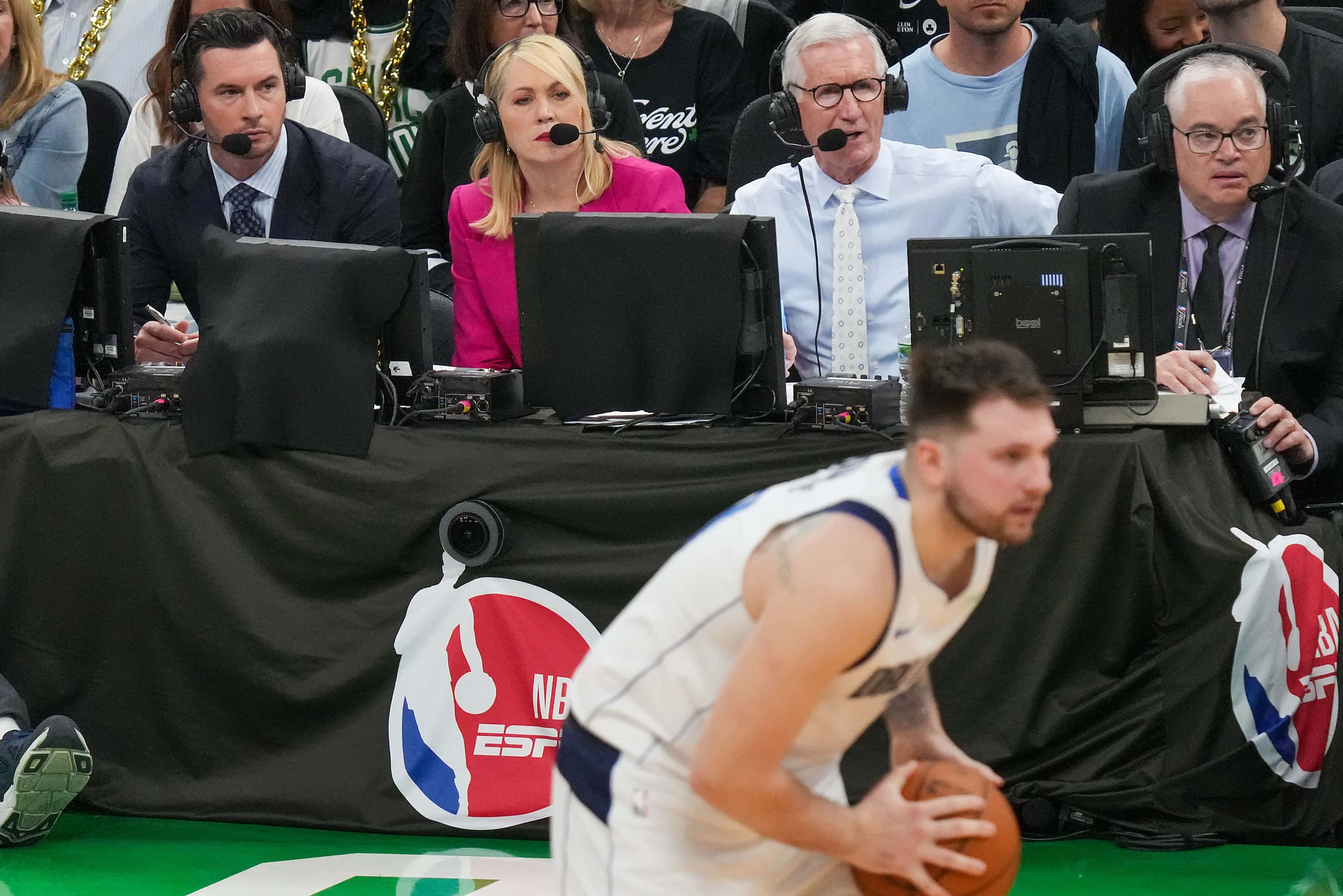 Doris Burke looks on from the broadcast table as Dallas Mavericks guard Luka Doncic looks to...