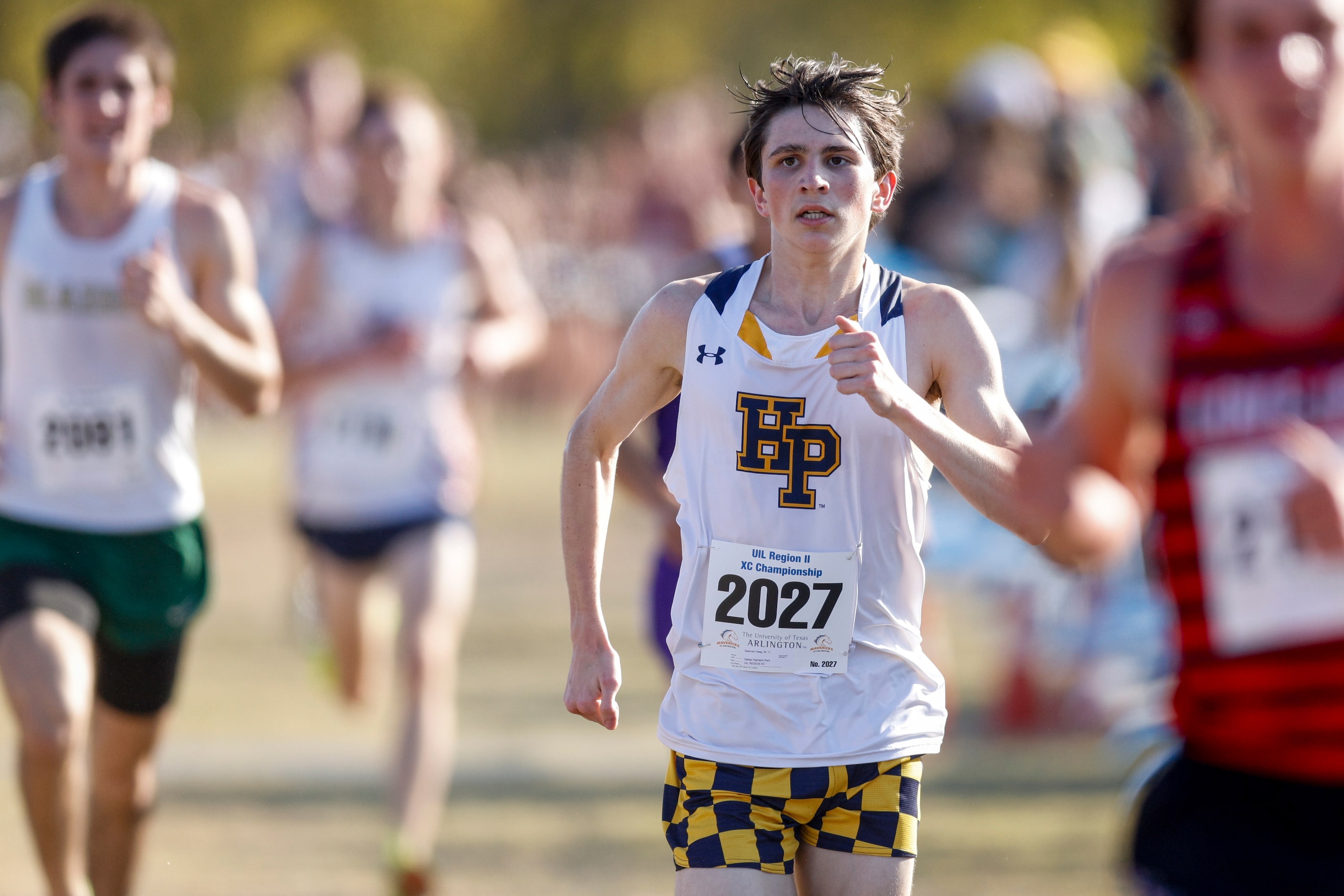 Highland Park’s Spencer Haag races to the finish line during the UIL Class 5A Region II...