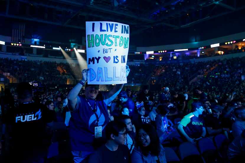 Fans celebrate during the Overwatch League match between the Dallas Fuel and the Houston...