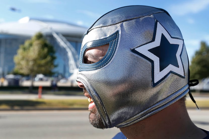 Adam Alvarez of Dallas comes to the game ready for battle as he tailgates before the...
