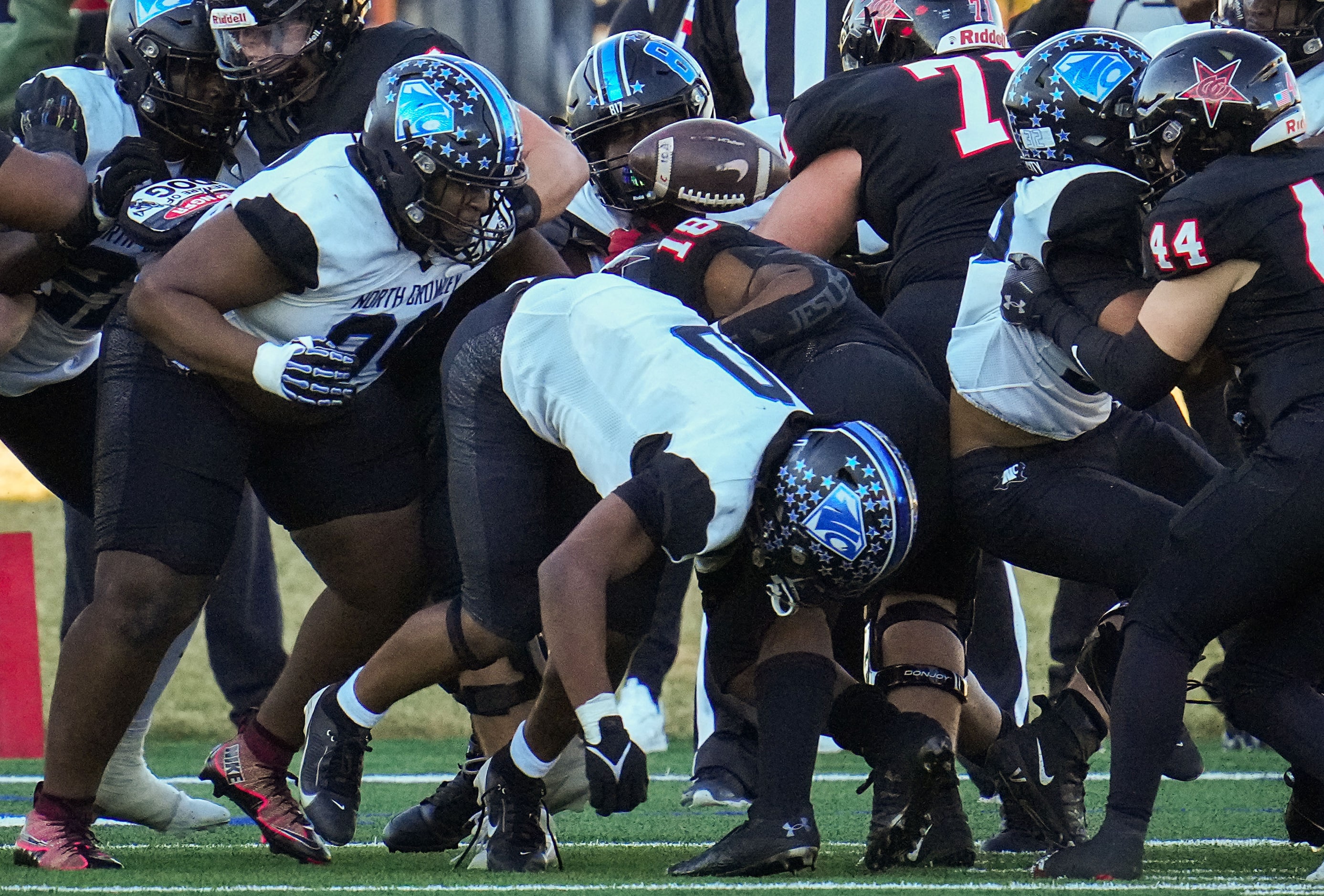 Coppell running back Joshua Lock (18) turns the ball over with a fumble at the North Crowley...