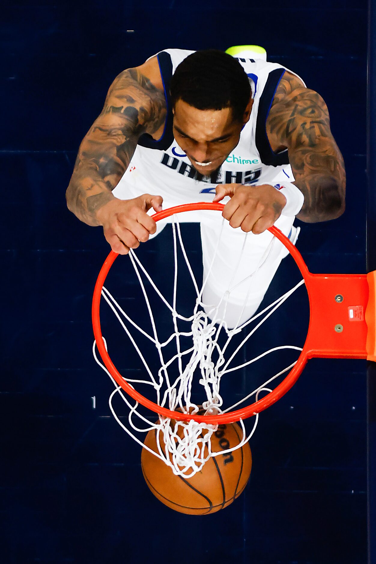 Dallas Mavericks forward P.J. Washington dunks the ball during the second half in Game 5 of...