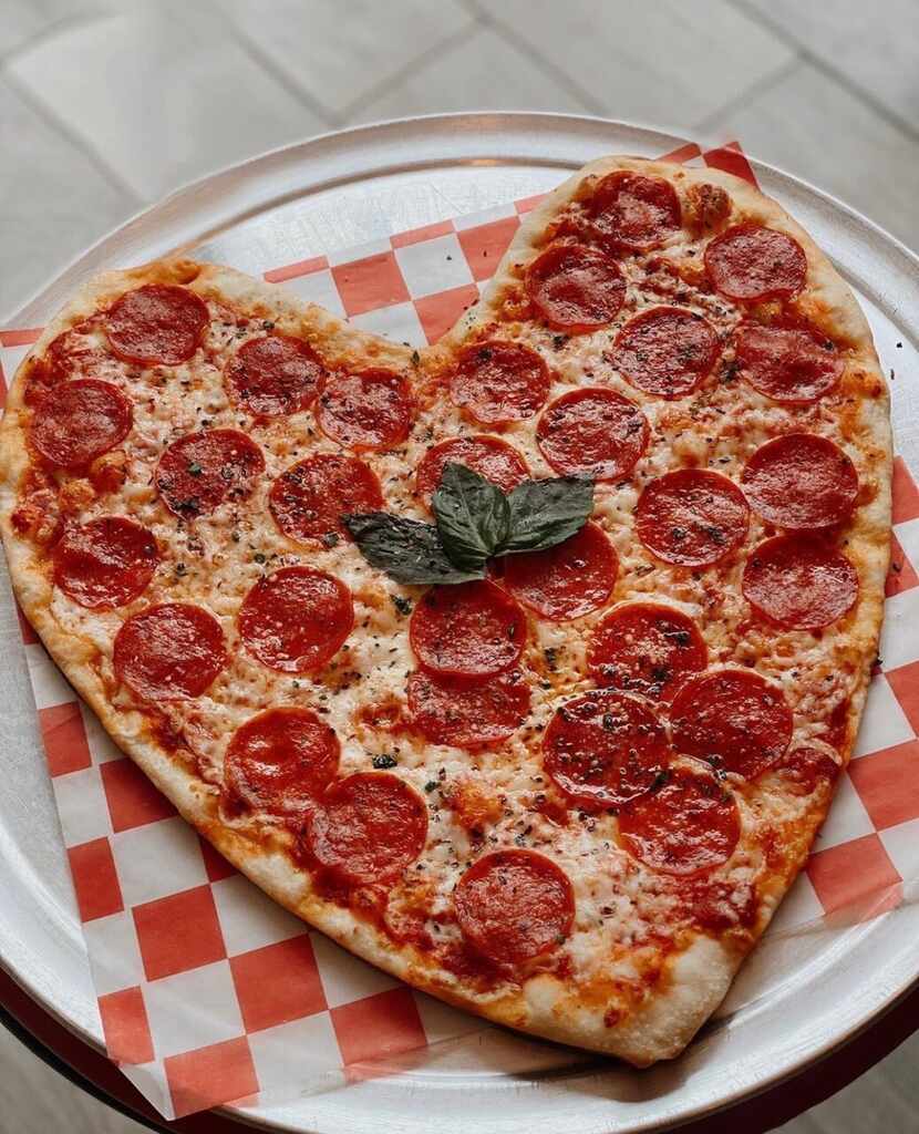 Sfereco serves a heart-shaped pizza in honor of Valentine's Day.