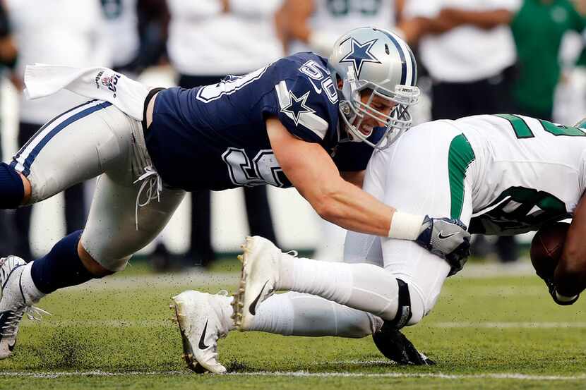 Dallas Cowboys outside linebacker Sean Lee (50) tackles New York Jets wide receiver Jamison...