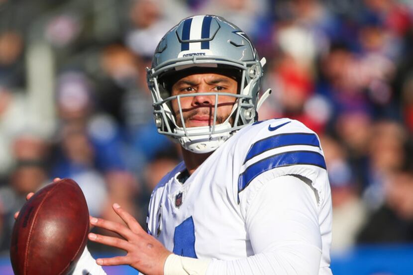 Dallas Cowboys quarterback Dak Prescott (4) looks to make a pass in the first half of an NFL...