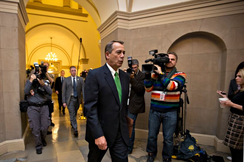 House Speaker John Boehner of Ohio arrives on Capitol Hill in Washington, Tuesday, Jan. 1,...