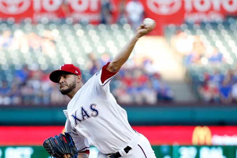 Texas Rangers starting pitcher Martin Perez (33) pitches against the San Diego Padres in the...