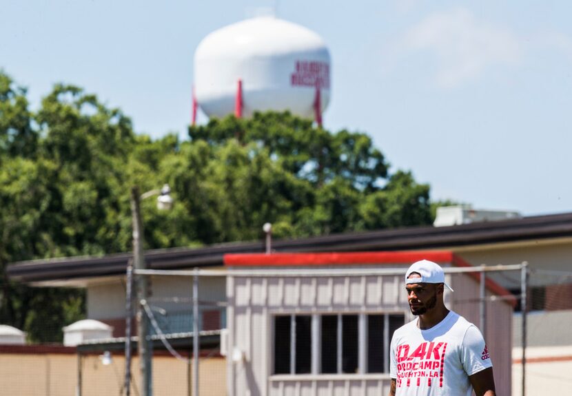 Dallas Cowboys quarterback Dak Prescott stands on the softball field as hosts his Dak...