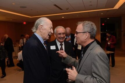 At left, Dr. Donald Seldin enjoys a moment with fellow physicians Wadi Suki and Matt Breyer...