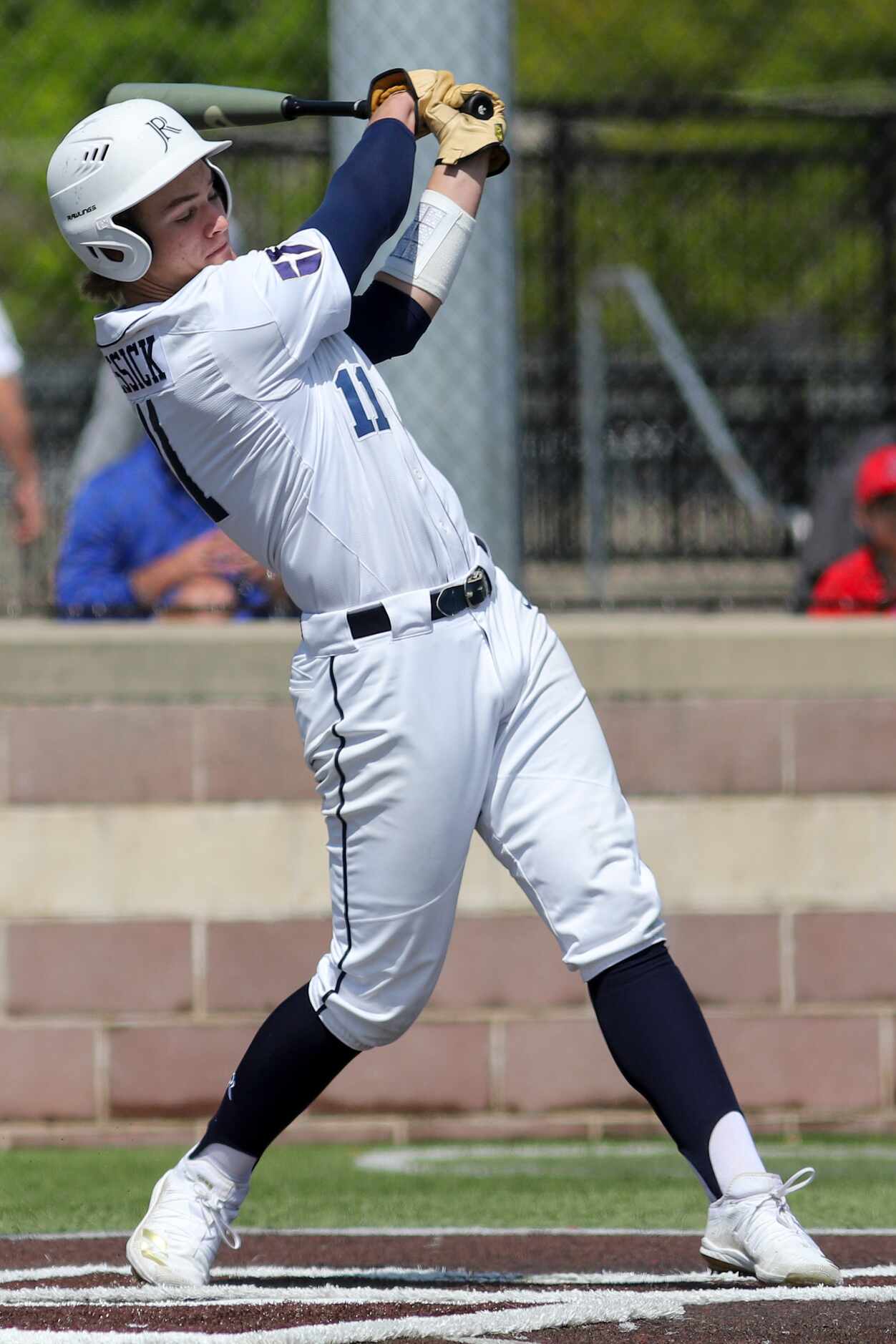 Jesuit third baseman Drew Messick swings for a pitch during a district 7-6A game against...