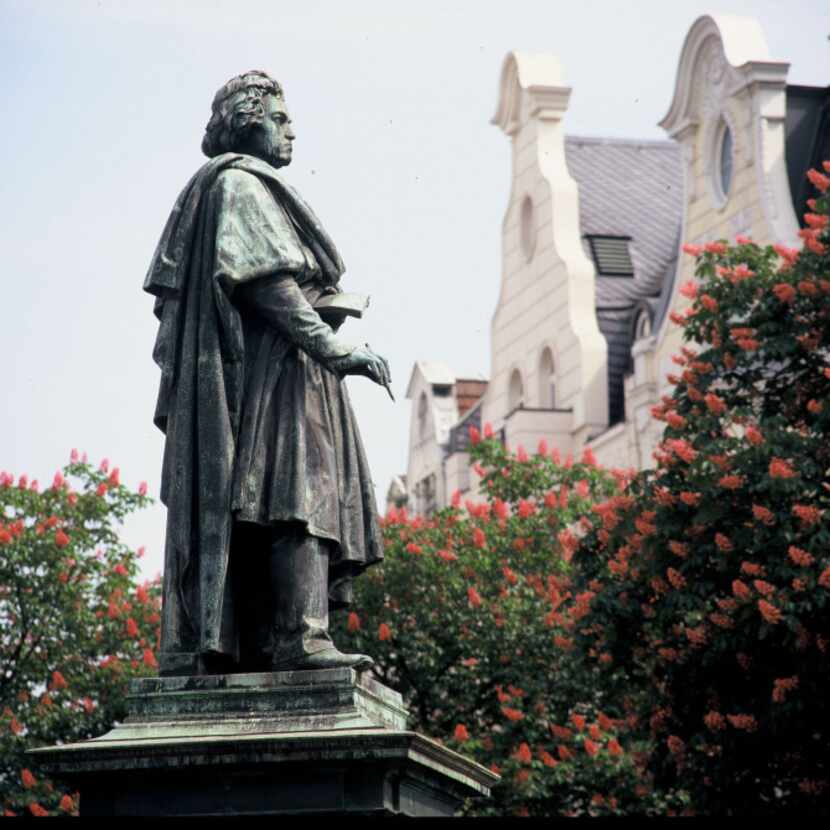  Bonn's towering bronze statue of Ludwig van Beethoven. The small, four-story house at...
