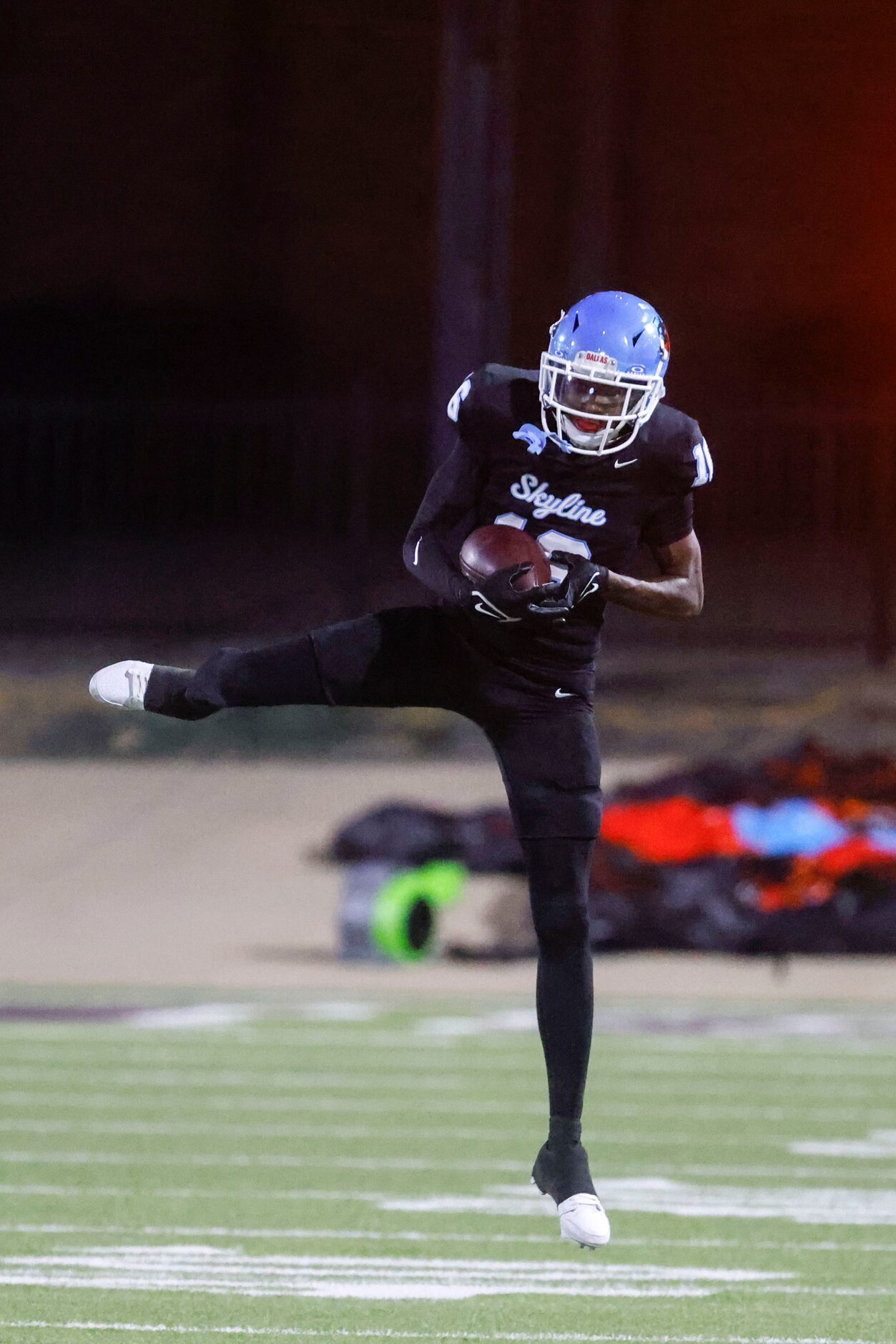 Skyline High’s A’Kryan Hunter receives a pass against Lancaster High during the first half...