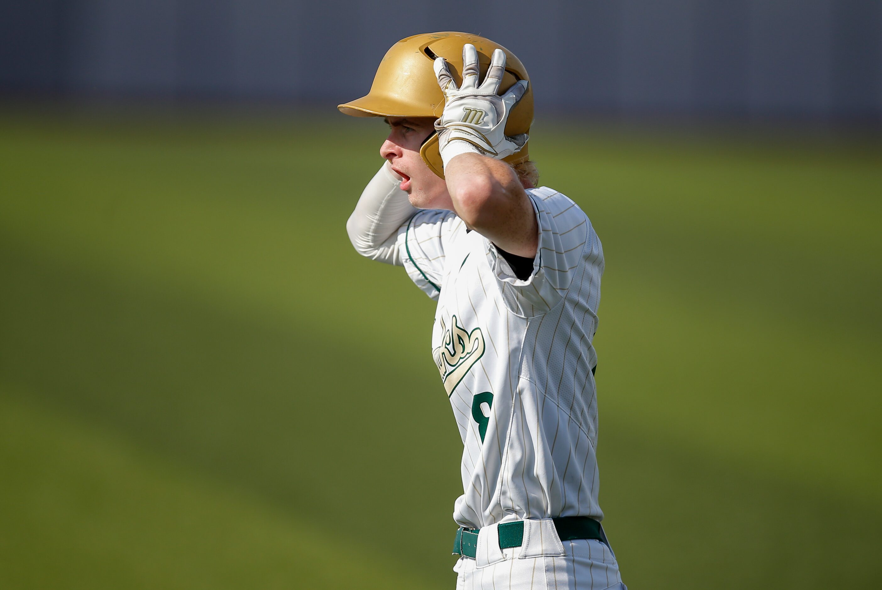 Birdville’s Alex Showalter (8) reacts to being called out at first during the second inning...