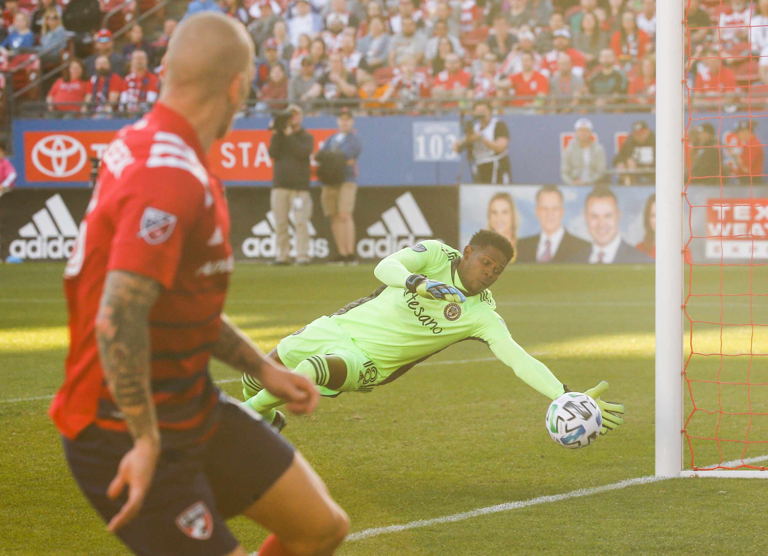 Philadelphia Union goalkeeper Andre Blake (18) makes a save against FC Dallas attacker...