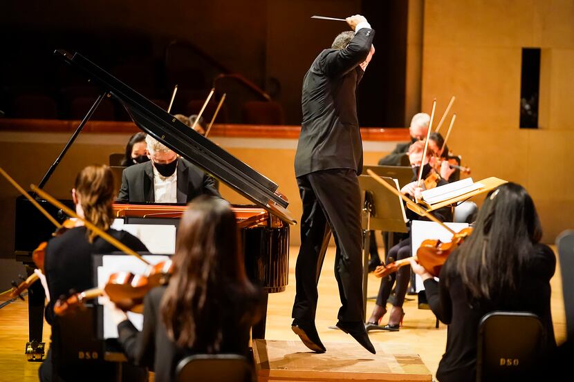 Guest conductor Andrew Grams conducts the Dallas Symphony Orchestra with pianist William...