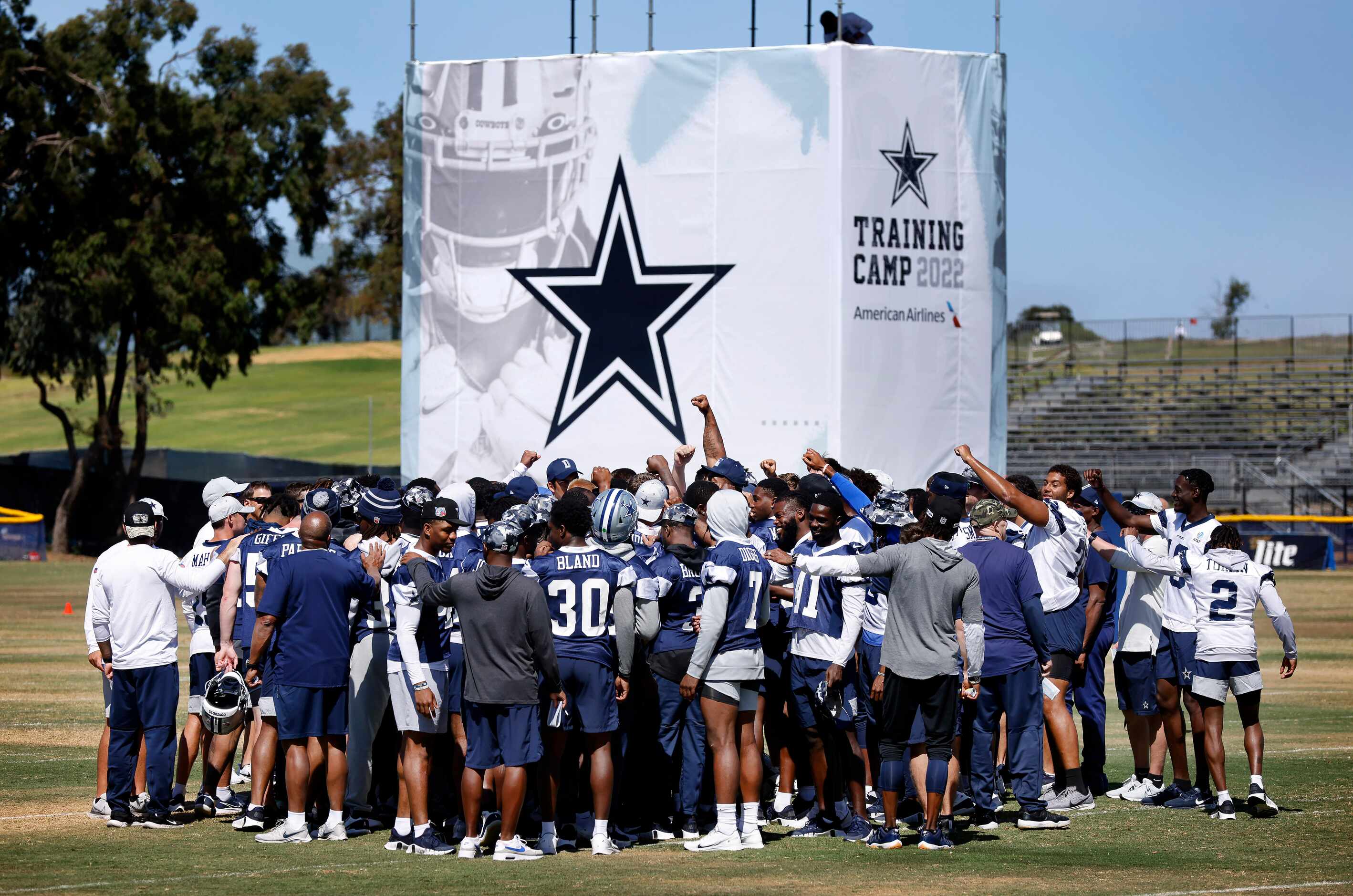 The Dallas Cowboys football team huddles for the final time as they broke training camp...