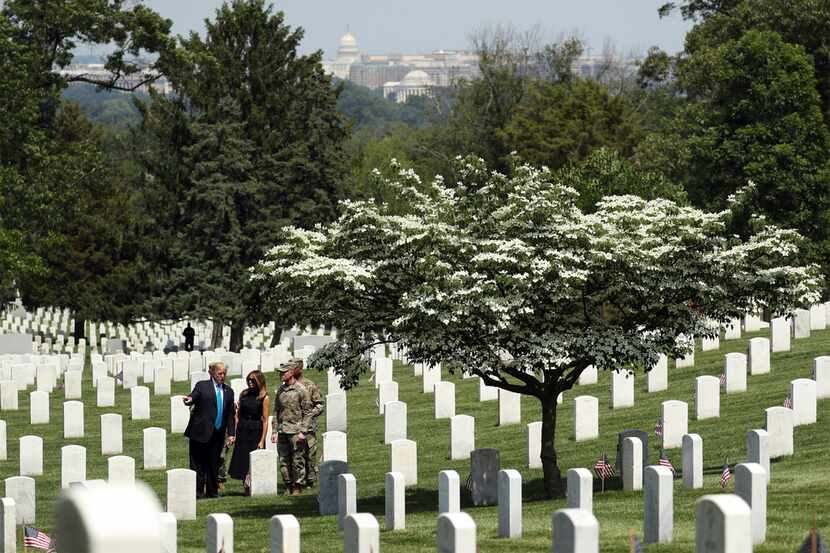 President Donald Trump and first lady Melania Trump visit Arlington National Cemetery for...