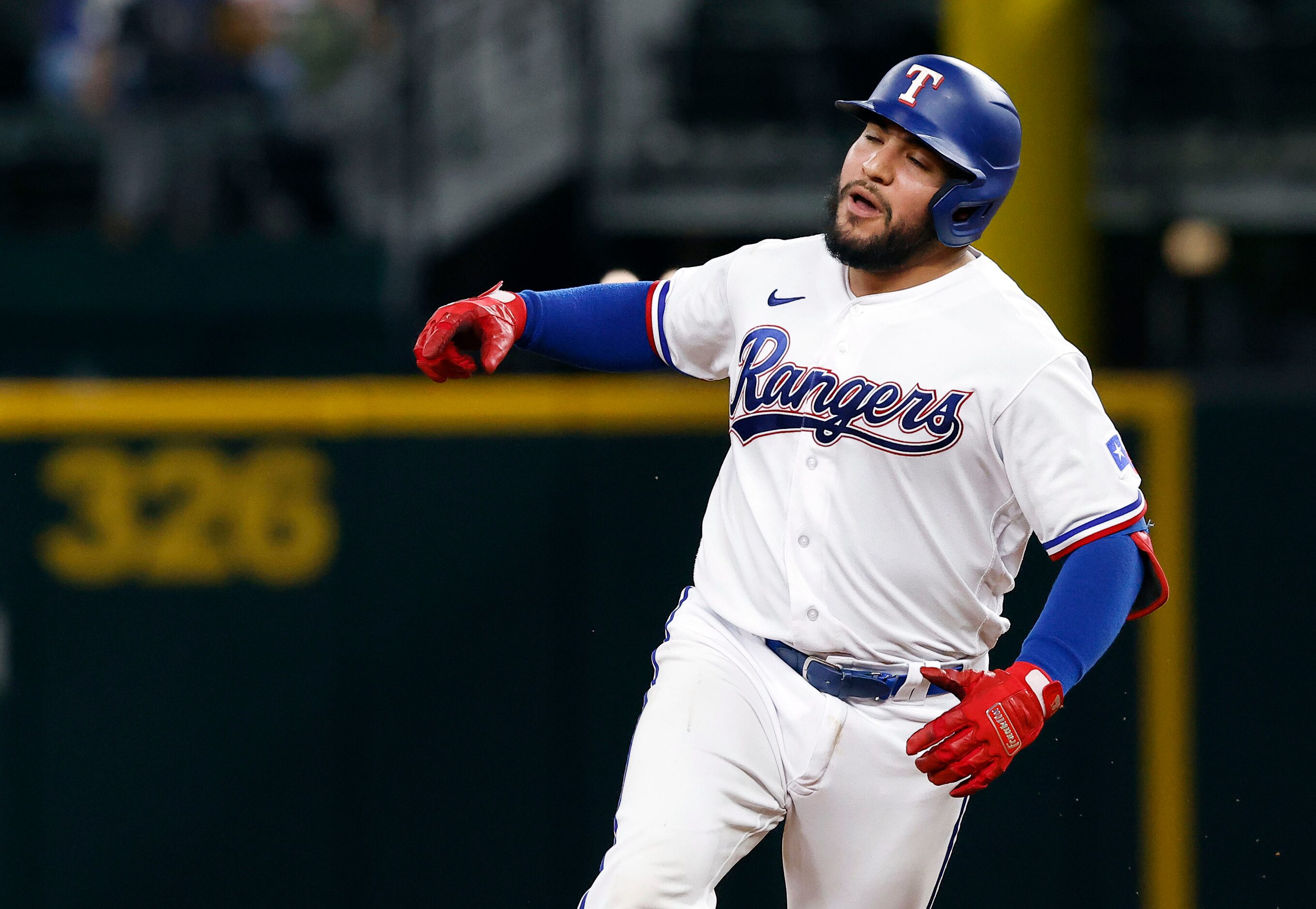 Texas Rangers batter Jose Trevino (23) celebrates his two-run homer off of Boston Red Sox...