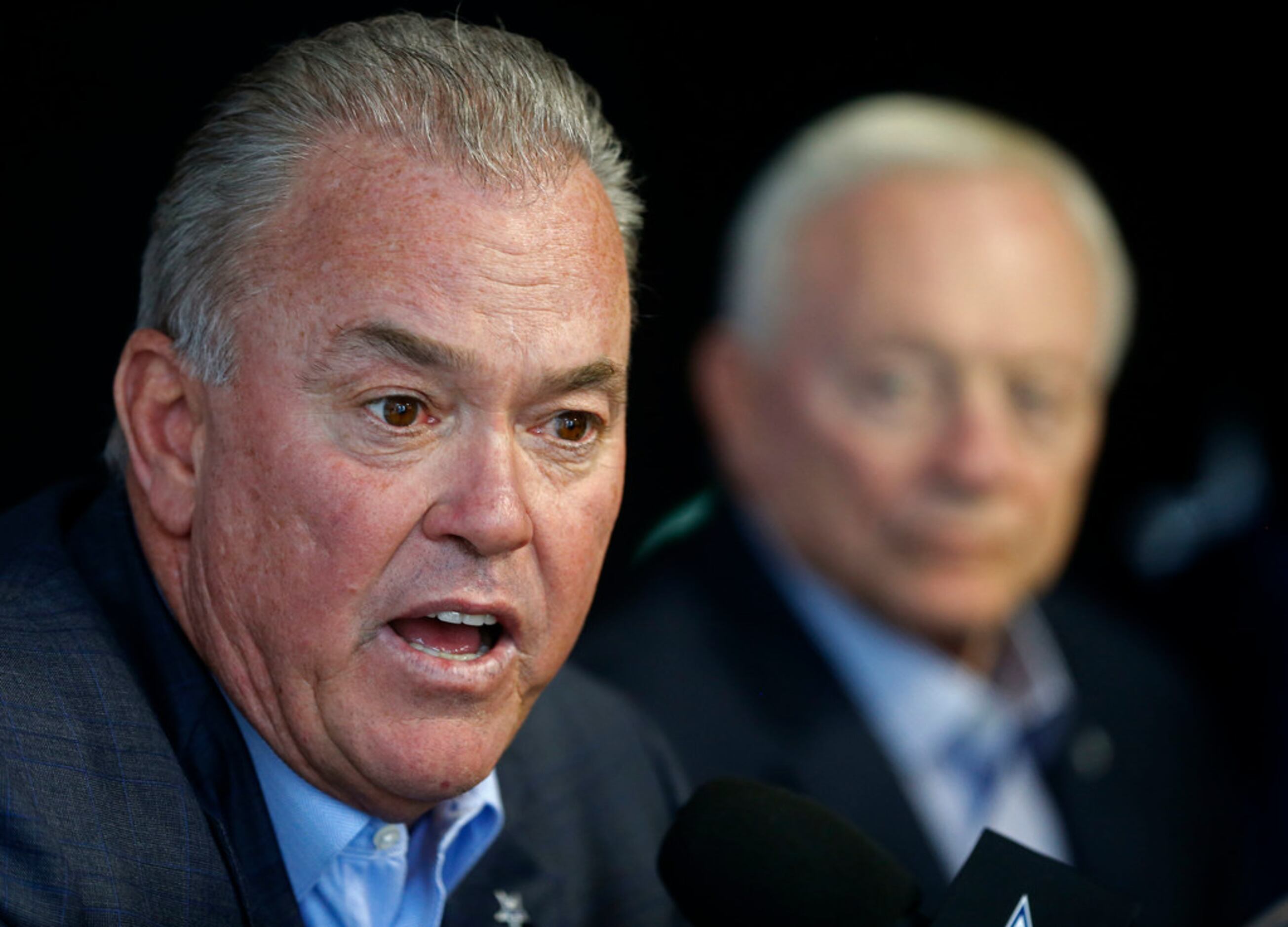 Dallas Cowboys Executive Vice President Jerry Jones Jr., left, and Chief  Operating Officer Stephen Jones, right, on the field before the start of an  NFL football game against the Washington Redskins, Sunday