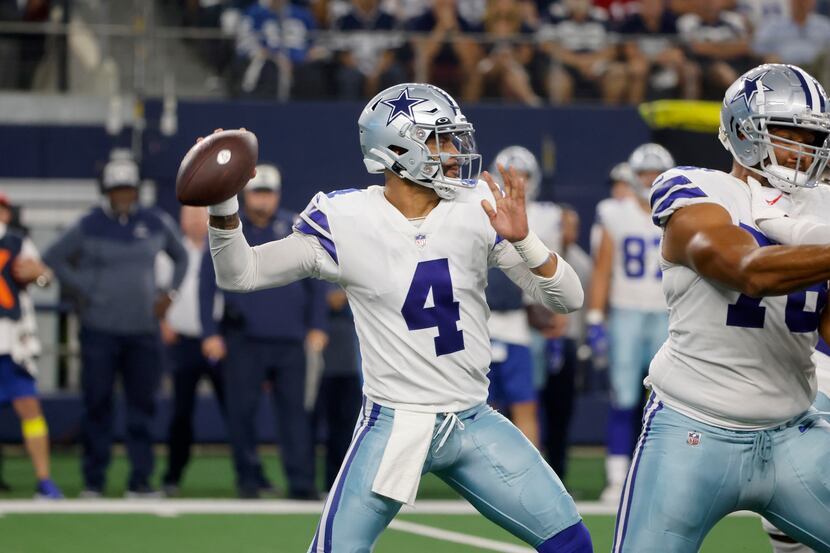 Dallas Cowboys quarterback Dak Prescott (4) prepares to throw the ball during an NFL...