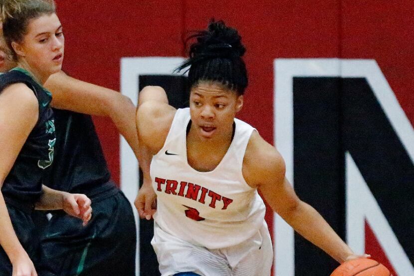 Baylor signee Trinity Oliver (3) of Euless Trinity has been one of the area's top scorers,...