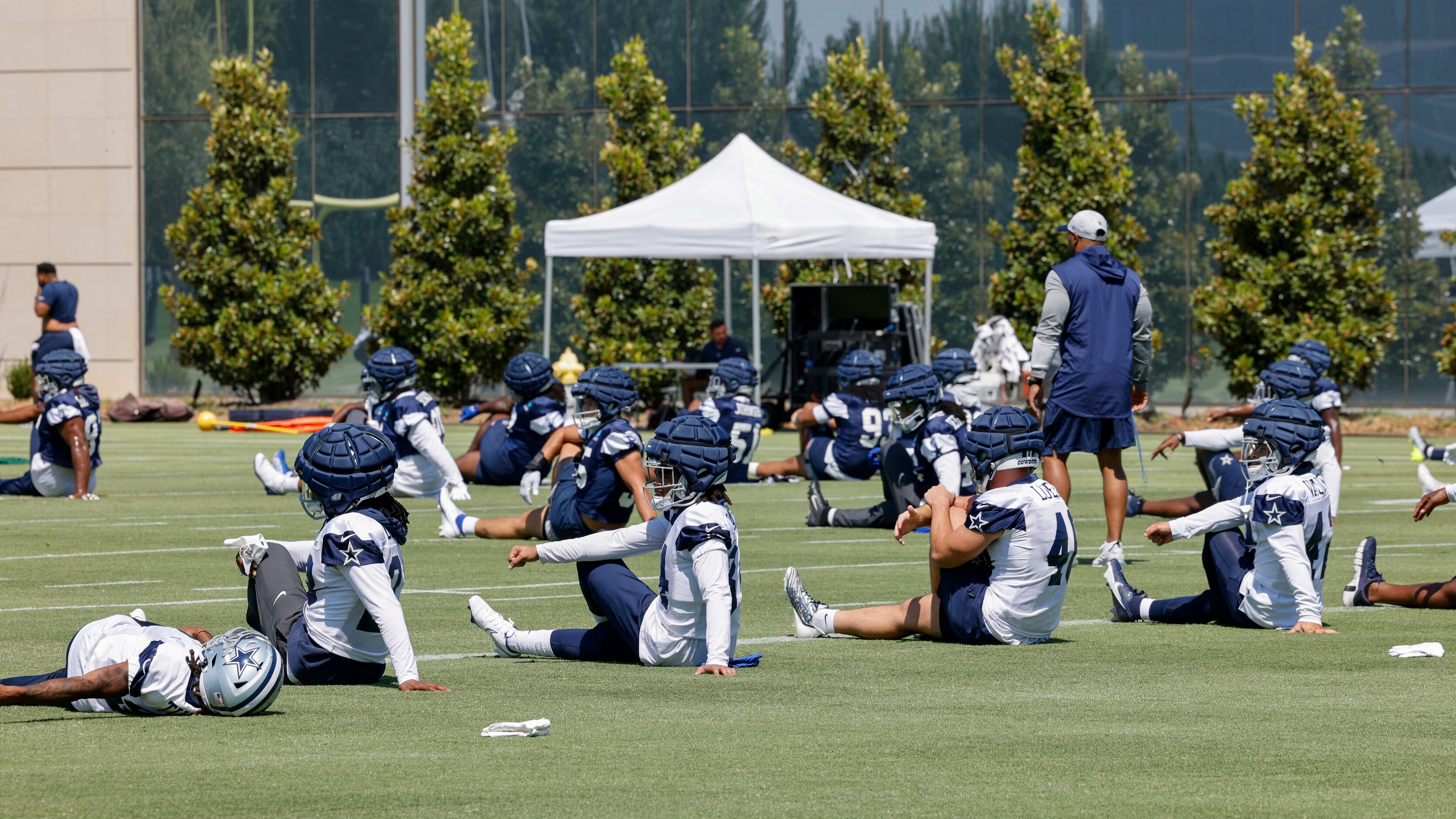 Dallas Cowboys players stretch during a practice at The Star, Wednesday, Sept. 6, 2023, at...