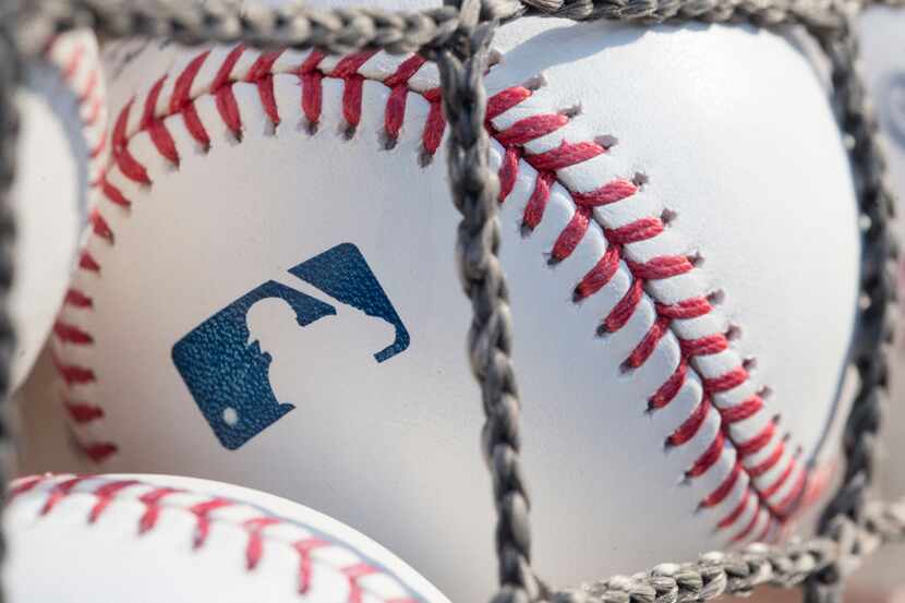 A baseball with MLB logo is seen at Citizens Bank Park before a game between the Washington...