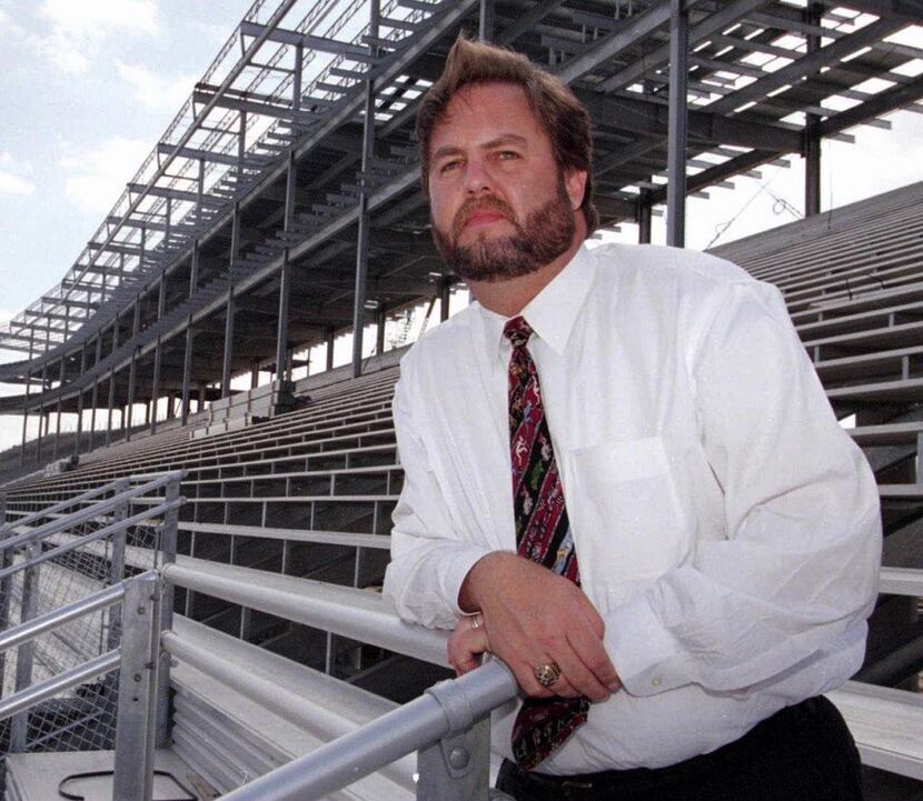 Texas Motor Speedway's Eddie Gossage poses in the unfinished grandstands at the Fort Worth,...