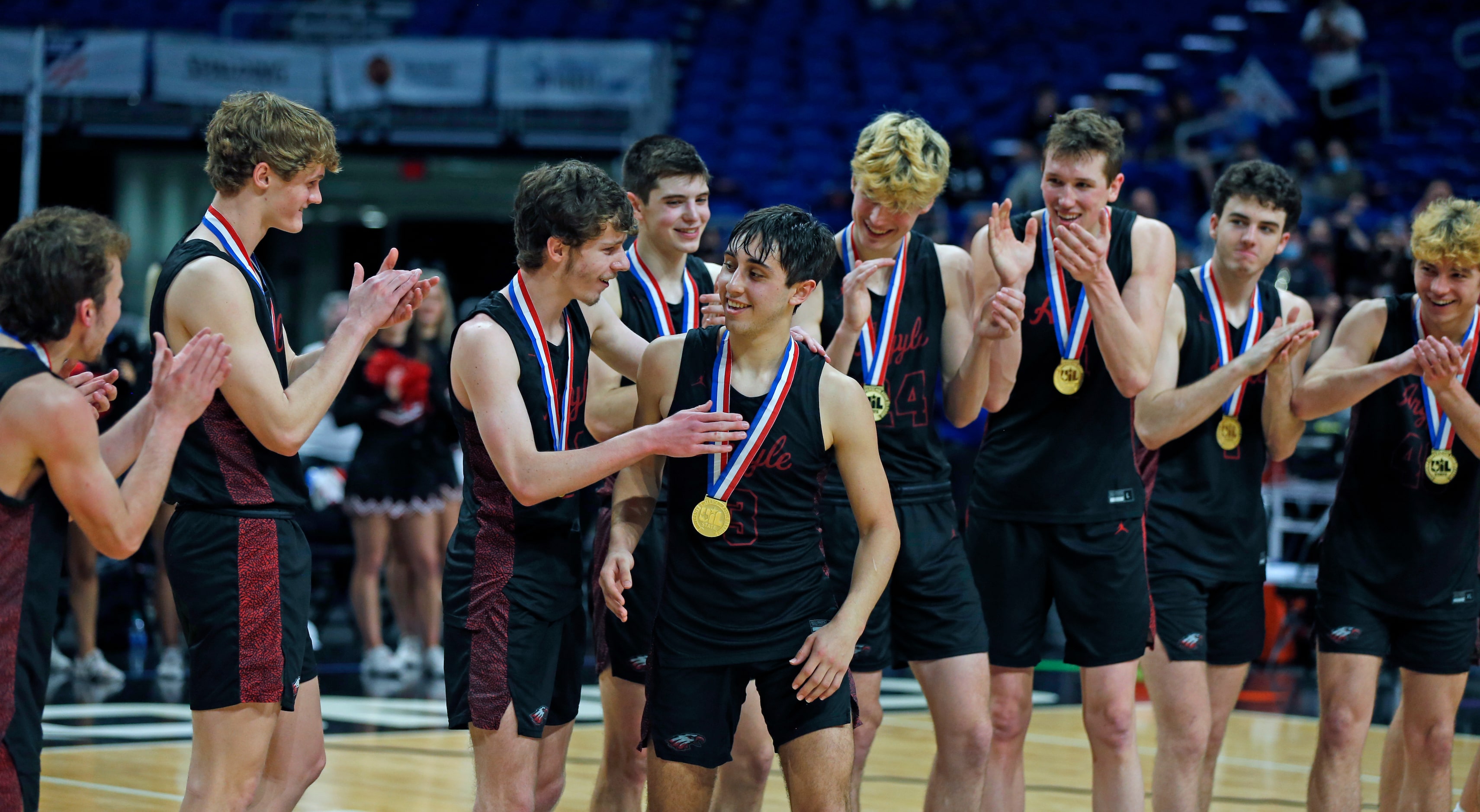 Argyle Skylar McCurry #3 is congratulated after being awarded most valuable player of the...