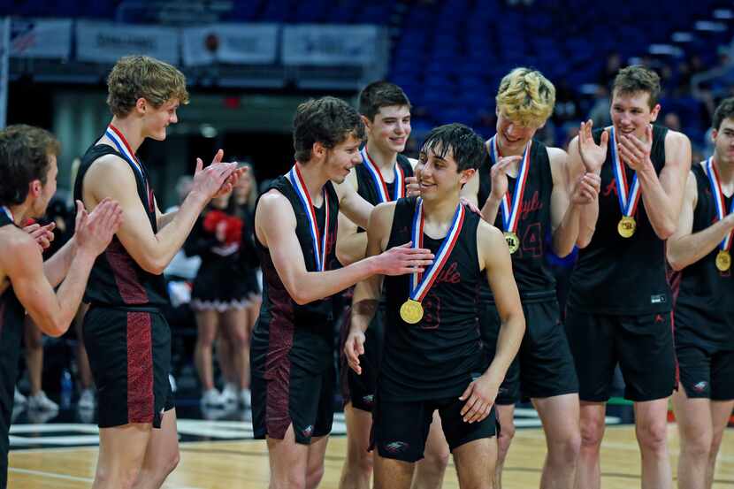 Argyle Skylar McCurry #3 is congratulated after being awarded most valuable player of the...