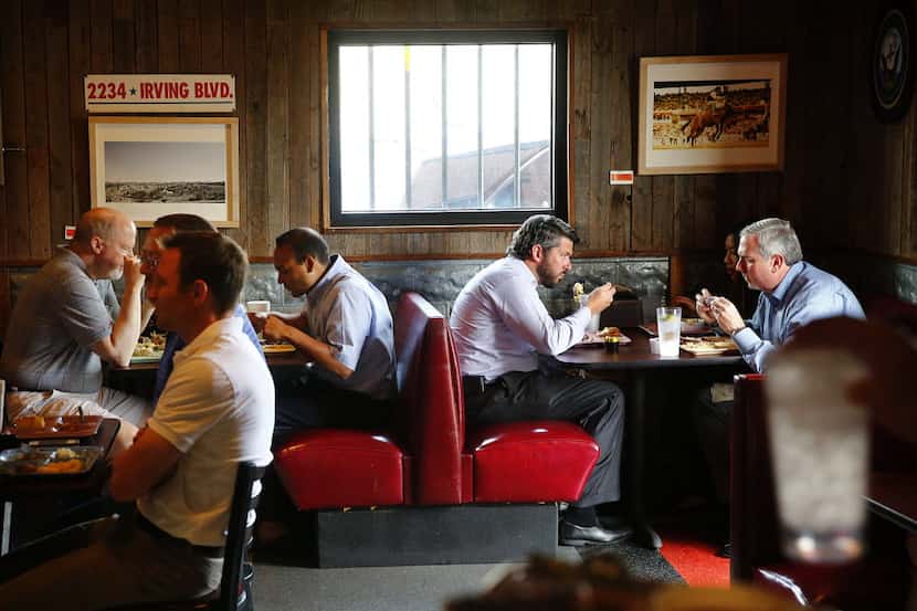 The Slow Bone's dining room in 2013. Owner Jack Perkins has sold the barbecue restaurant to...