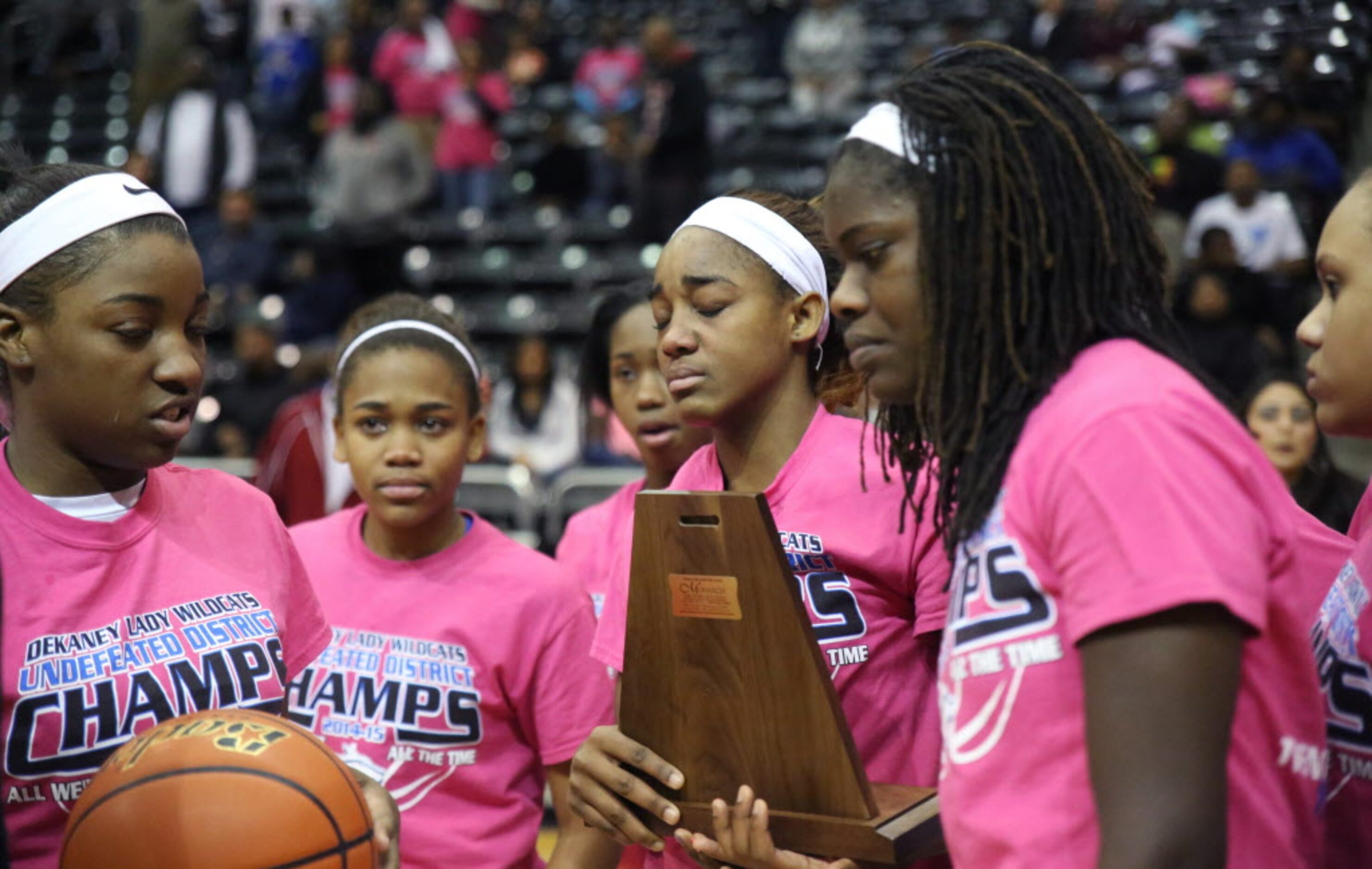 Dekaney players sulk as they accept their second place trophy after losing the the region II...