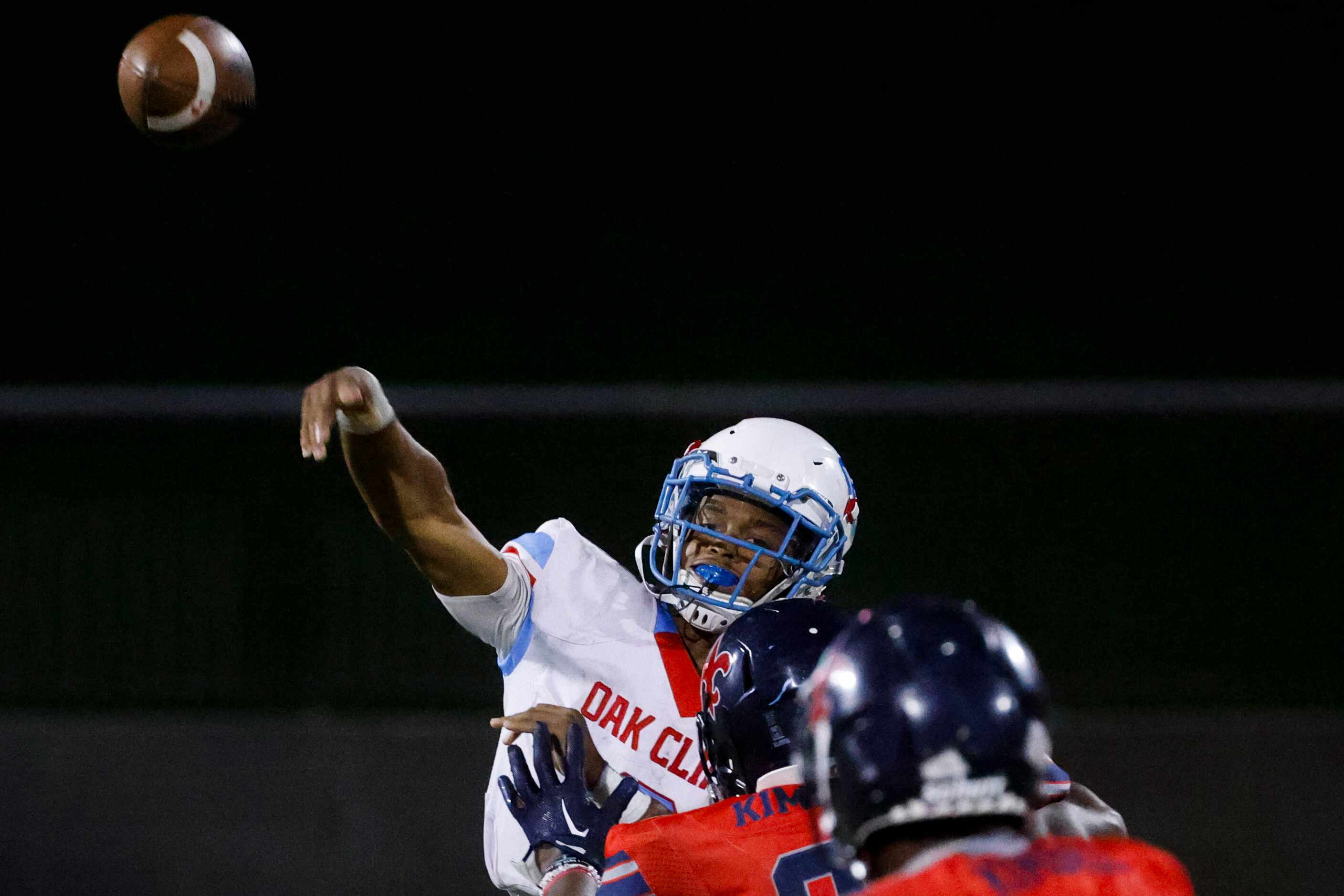 Carter high’s QB Quaylon Robinson throws against Kimball high during the second half of a...
