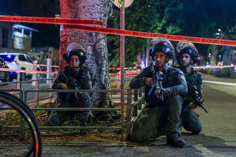 Israeli police take position after a shooting in Jaffa, a mixed Arab-Jewish area of Tel...