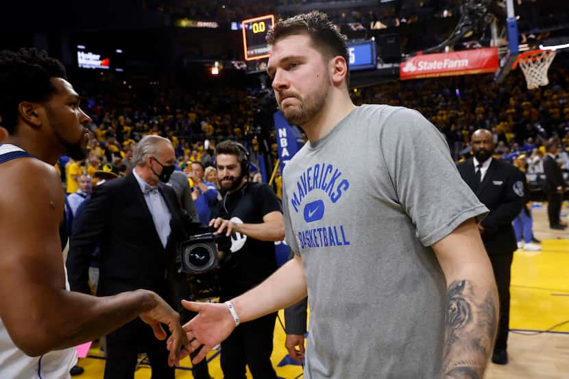 Dallas Mavericks guard Luka Doncic (77) walks off the court following their series loss to...