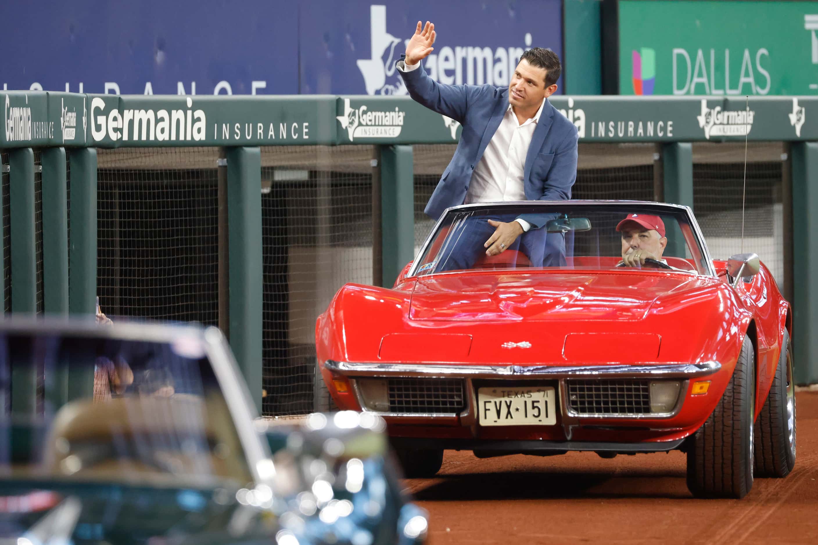 Former Texas Ranger Ian Kinsler waves as he arrives at the induction ceremony at Globe Life...