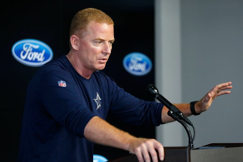 Dallas Cowboys head coach Jason Garrett answers questions during a press conference before...