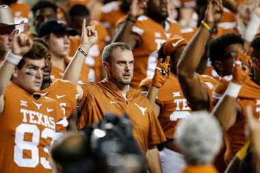 AUSTIN, TX - SEPTEMBER 08:  Head coach Tom Herman of the Texas Longhorns sings The Eyes of...