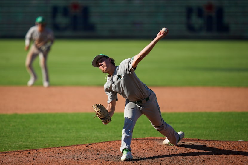 Southlake Carroll pitcher Griffin Herring delivers during the seventh inning of a UIL 6A...