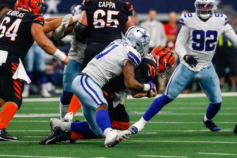Dallas Cowboys linebacker Micah Parsons (11) sacks Cincinnati Bengals quarterback Joe Burrow...
