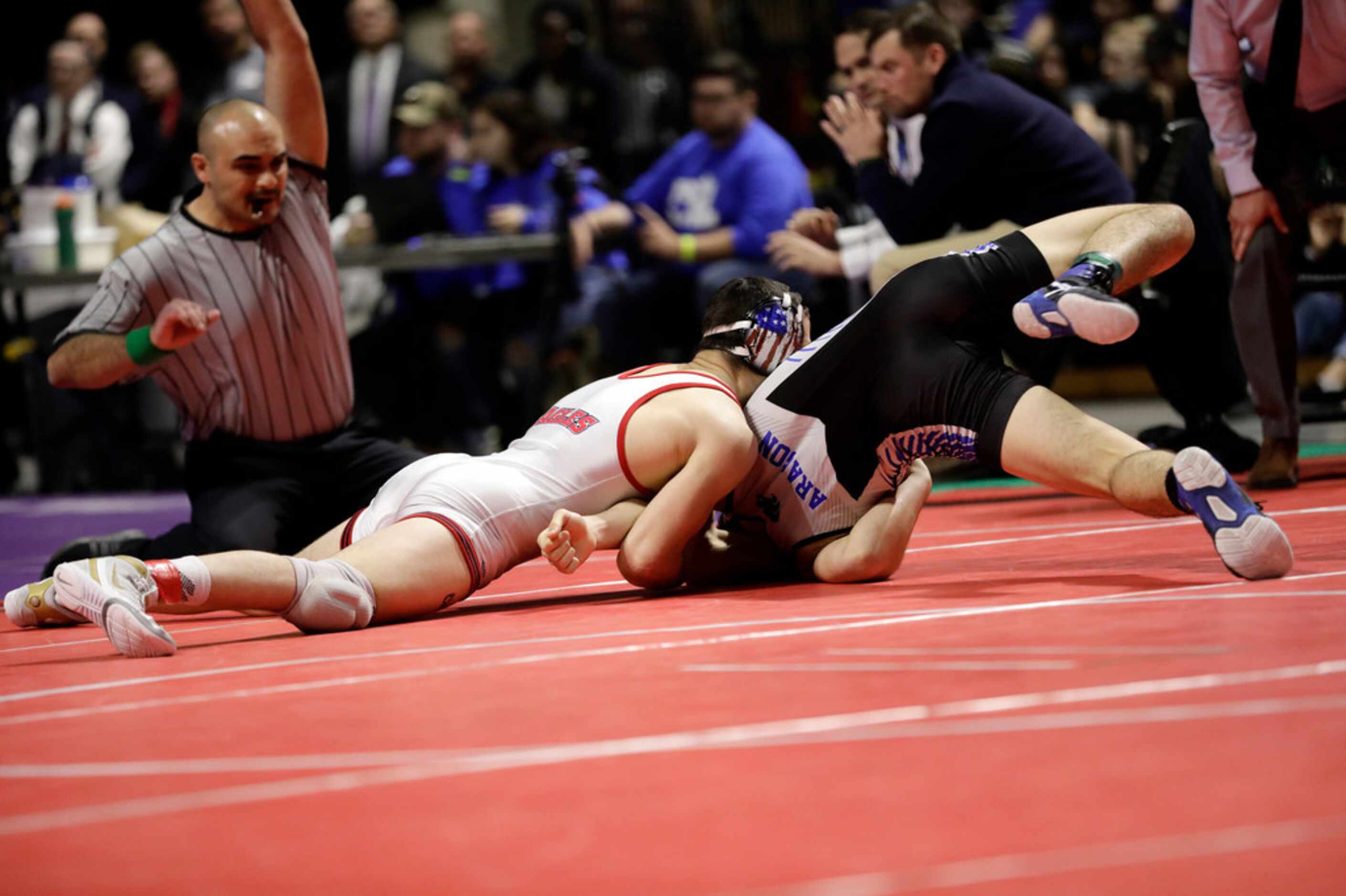 Mario Danzi of Allen wrestles during the UIL Texas State Wrestling Championships, Saturday,...