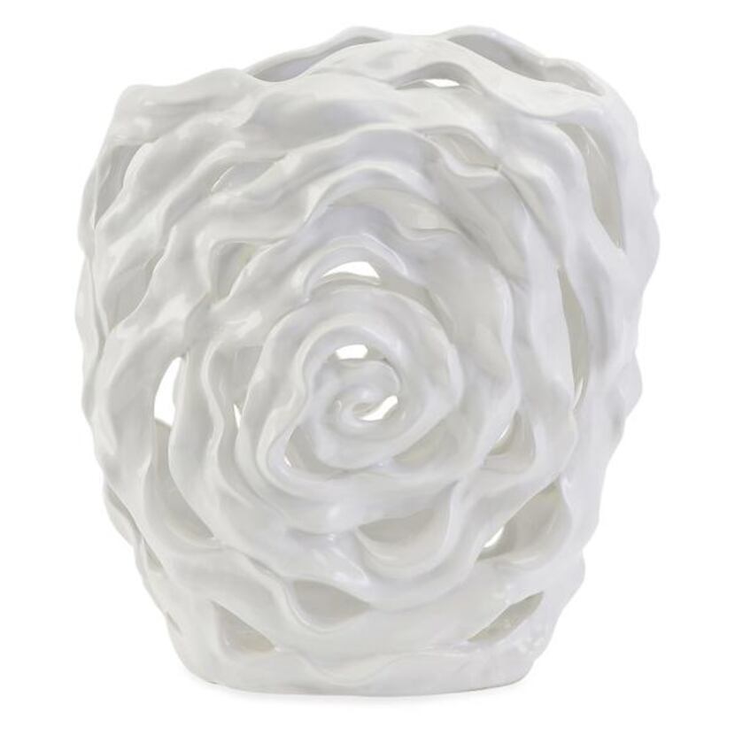
Flower power: The Rebecca ceramic cutwork vase features a crisp, high-gloss finish. $199 at...